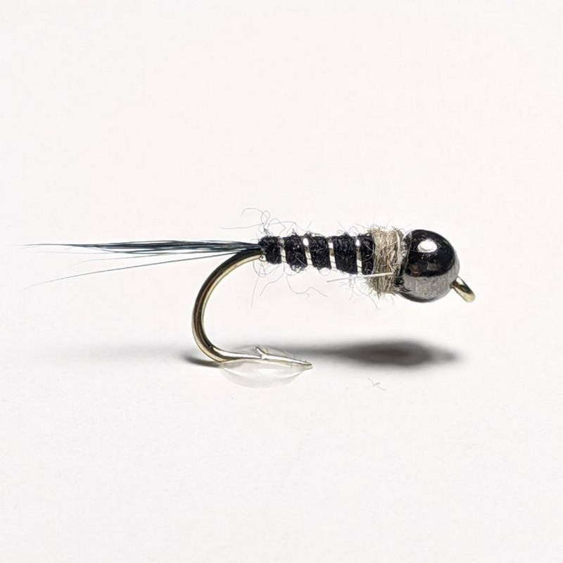 Fly Black and Silver nymph for trout and grayling